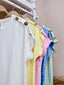 Camiseta mangas botones oro