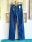 Pantalón tejano botones laterales
